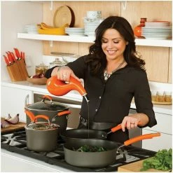 Top 10 👏 Rachael Ray Hard Anodized II Cookware Set W/ Orange Handles: 10pc 👍 -Le Creuset Shop rachael ray evoo bottles in use kitchen setting compressed 6 1